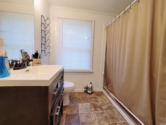 bathroom featuring crown molding, vanity, toilet, and curtained shower