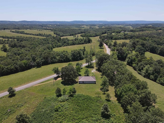 birds eye view of property featuring a rural view