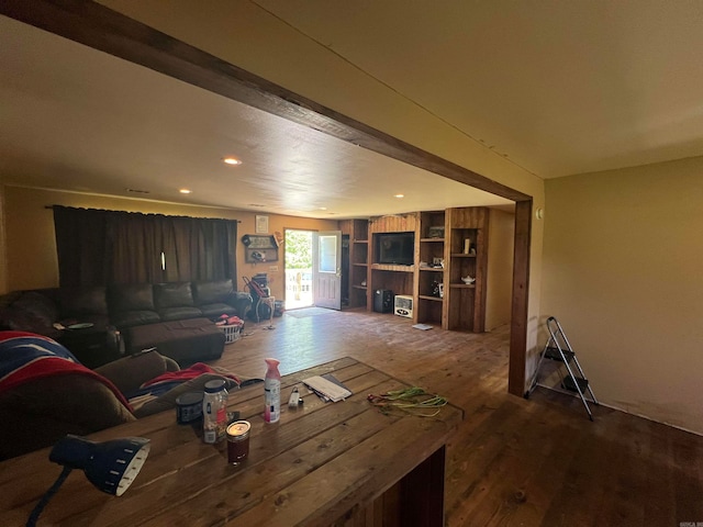 unfurnished living room featuring hardwood / wood-style floors