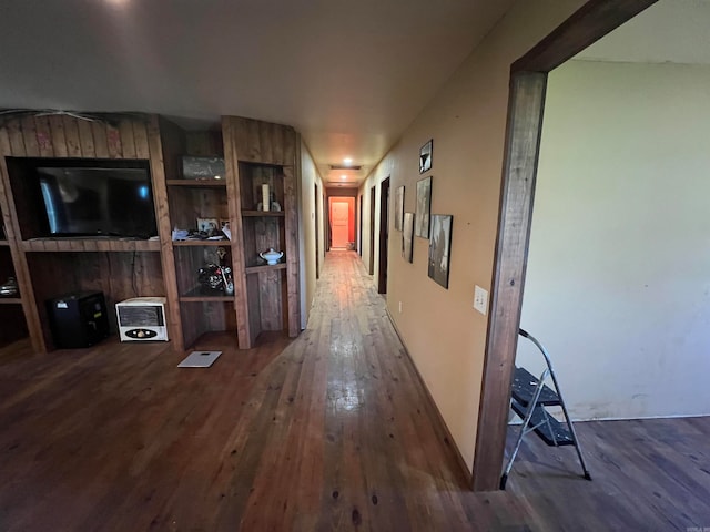 corridor featuring dark hardwood / wood-style floors