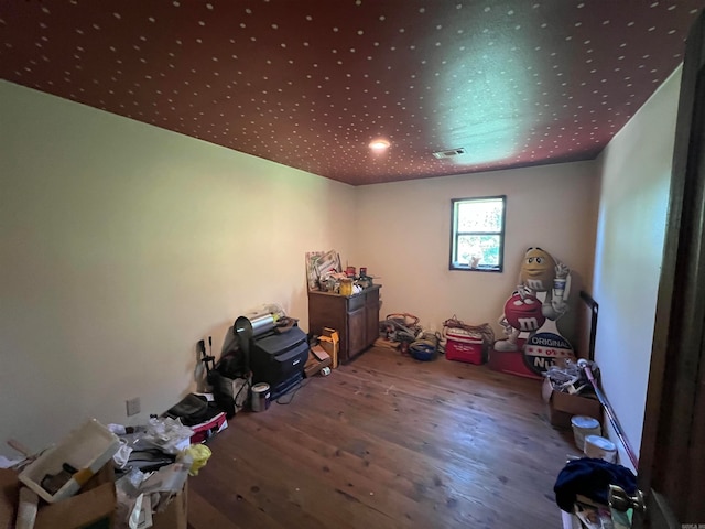 miscellaneous room with hardwood / wood-style floors