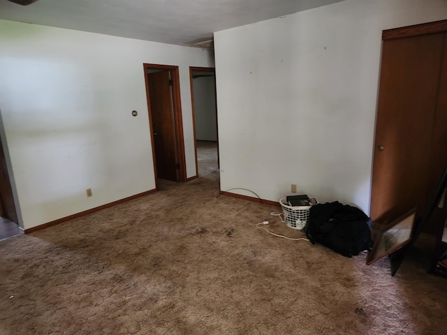 spare room with carpet floors