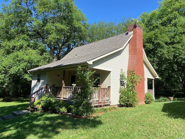 exterior space with a front yard