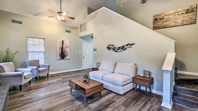 living room with ceiling fan, dark hardwood / wood-style flooring, and high vaulted ceiling