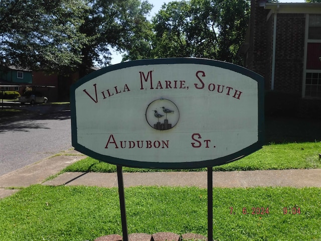 view of community sign