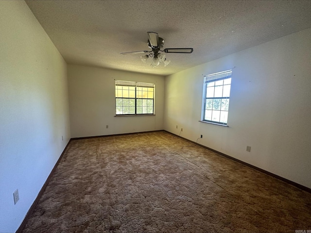 empty room with carpet, a textured ceiling, and ceiling fan