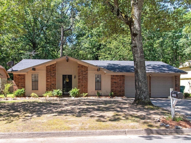 ranch-style home with a garage