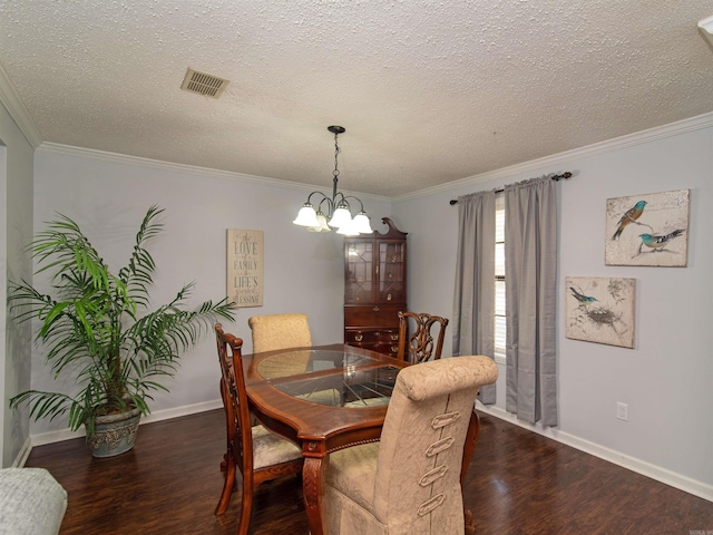 dining space featuring a chandelier, dark wood-type flooring, and ornamental molding