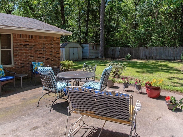 view of patio with a storage shed