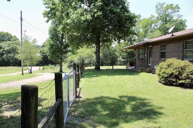 view of yard with fence