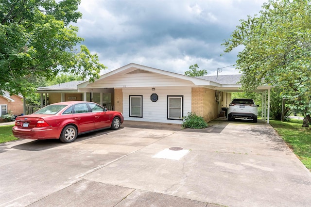 ranch-style house with a carport