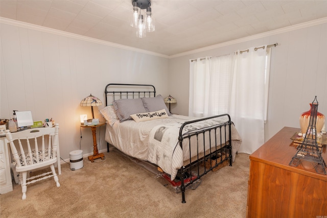 bedroom with carpet and ornamental molding