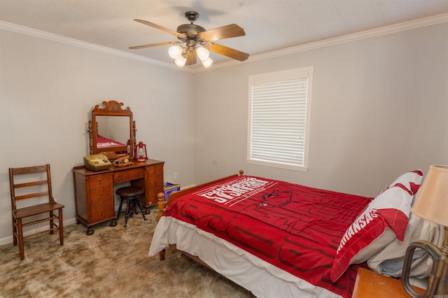 carpeted bedroom featuring ornamental molding and ceiling fan