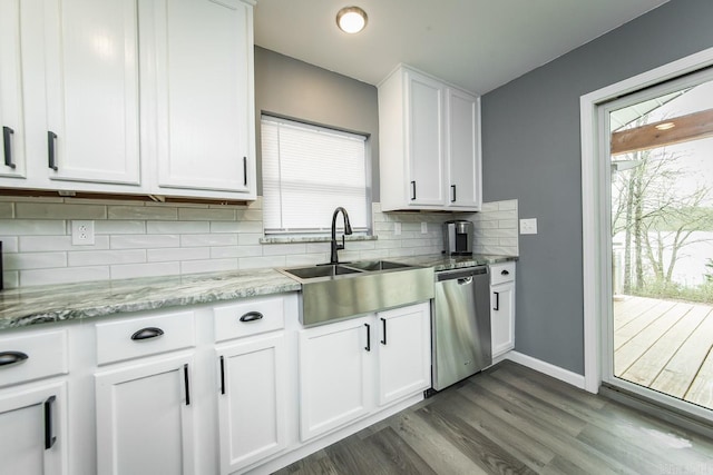 kitchen with white cabinetry, a healthy amount of sunlight, wood-type flooring, and stainless steel dishwasher