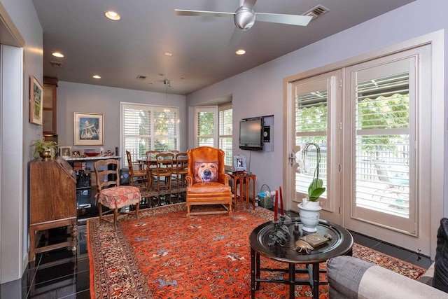 interior space featuring a ceiling fan, visible vents, and recessed lighting