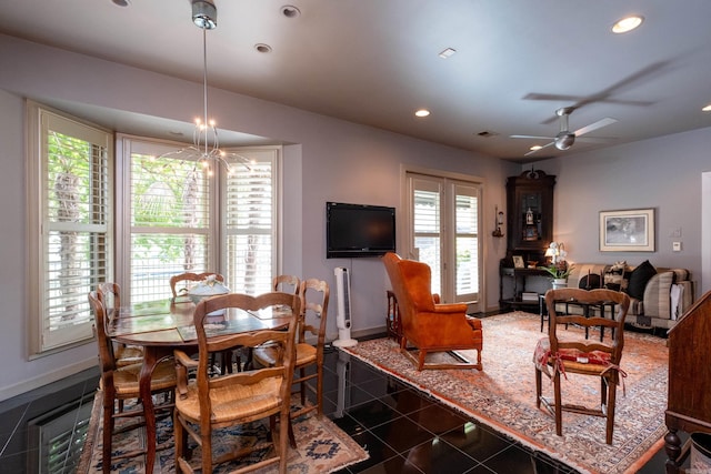 dining area featuring a ceiling fan, recessed lighting, dark tile patterned flooring, and baseboards