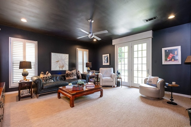 living room featuring recessed lighting, carpet flooring, a ceiling fan, visible vents, and baseboards