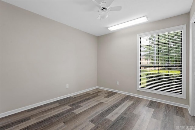 unfurnished room with ceiling fan and hardwood / wood-style floors