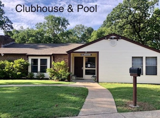 view of front of home with a front yard