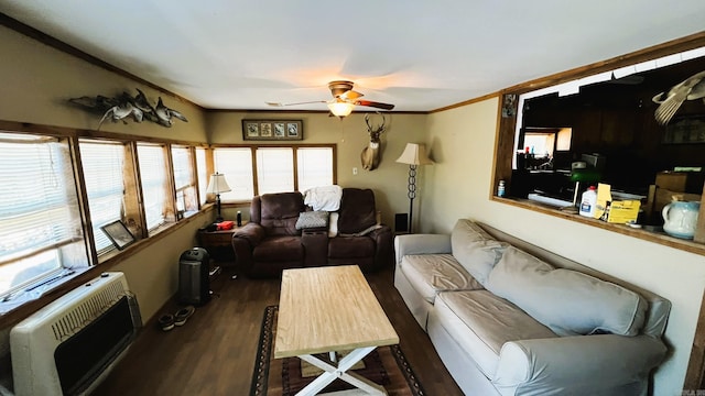 living room featuring ceiling fan, dark hardwood / wood-style flooring, crown molding, and a healthy amount of sunlight