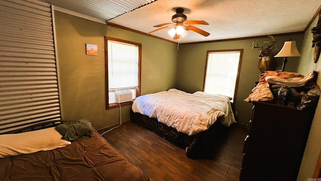 bedroom featuring a textured ceiling, ceiling fan, and dark hardwood / wood-style floors