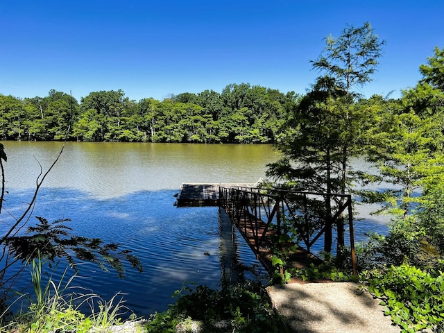 view of dock with a water view