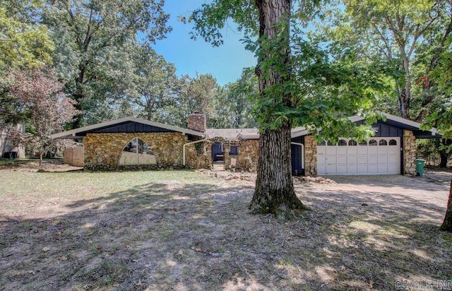 single story home with a garage