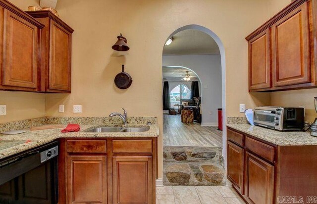 dining space with light hardwood / wood-style flooring and a textured ceiling