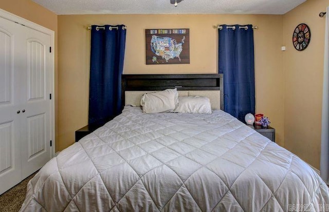 bedroom featuring a textured ceiling