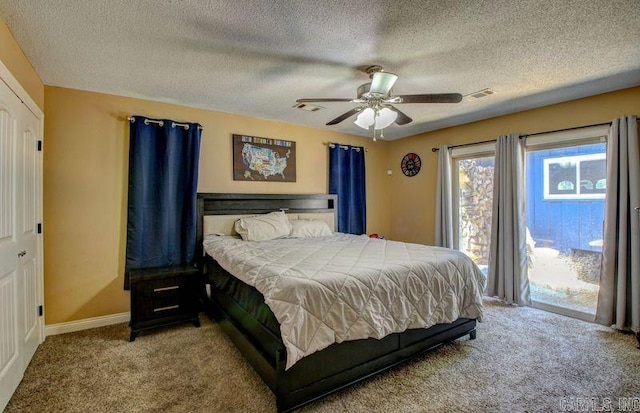 bedroom featuring visible vents, baseboards, a ceiling fan, access to outside, and carpet floors