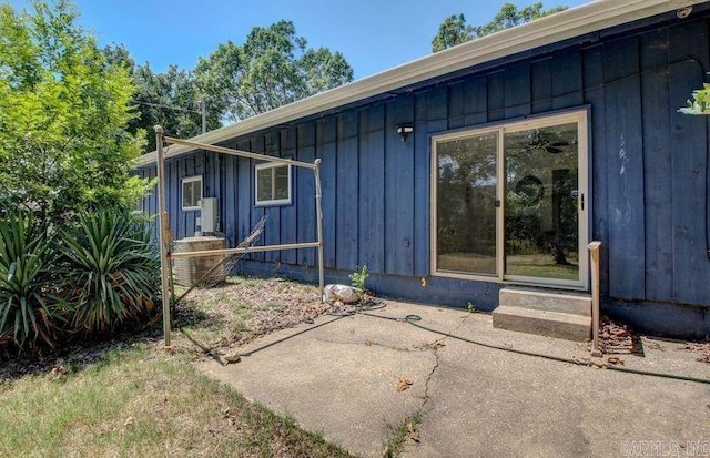 view of side of property with board and batten siding