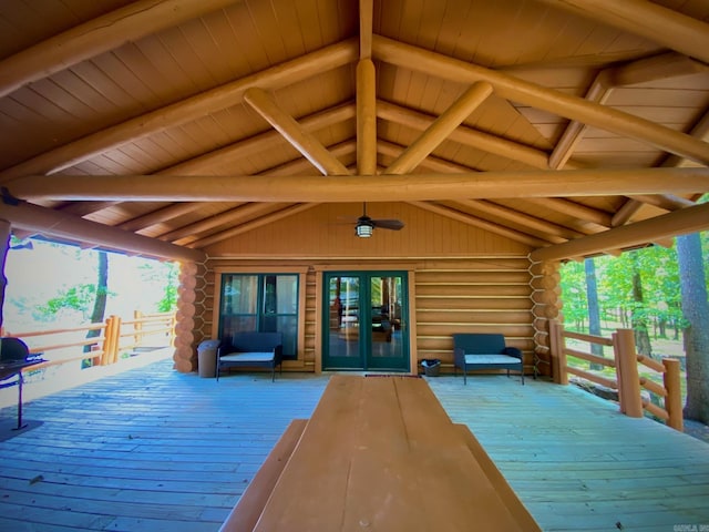 wooden deck featuring french doors