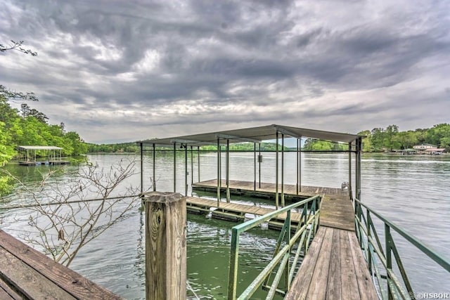 dock area featuring a water view