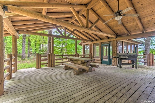 wooden deck featuring ceiling fan