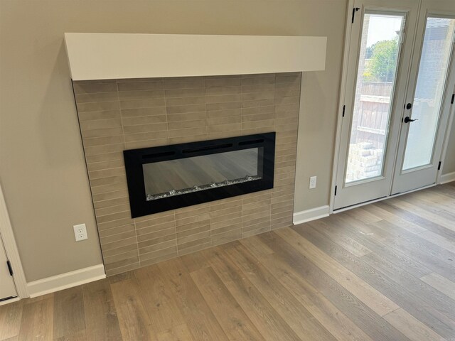 interior details featuring hardwood / wood-style floors and french doors