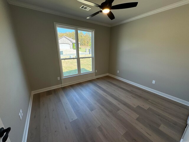 unfurnished room with hardwood / wood-style flooring, ceiling fan, and crown molding