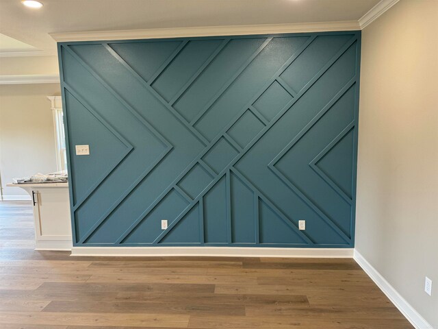 details with crown molding and hardwood / wood-style flooring