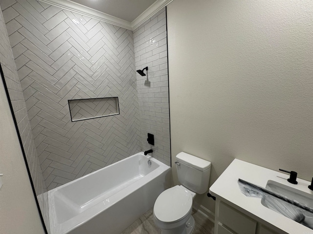 full bathroom featuring tiled shower / bath combo, vanity, crown molding, and toilet