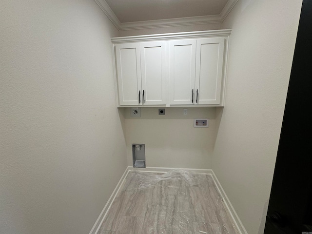 washroom with washer hookup, ornamental molding, cabinets, and electric dryer hookup