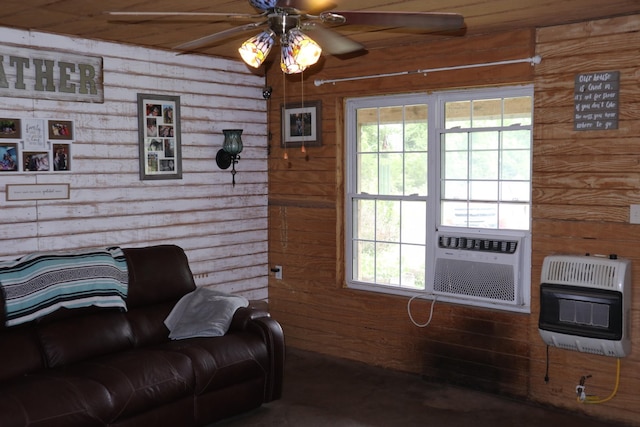 living room with heating unit, a wealth of natural light, and wood ceiling