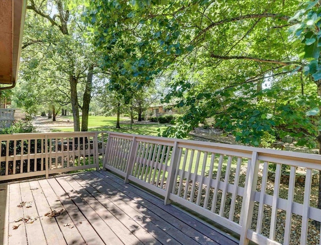 deck featuring a yard