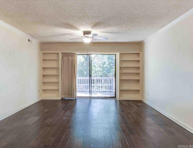 spare room featuring built in shelves, a textured ceiling, ceiling fan, and ornamental molding