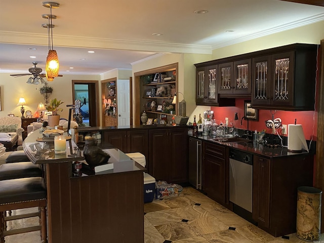 bar featuring dishwasher, dark brown cabinetry, hanging light fixtures, and sink