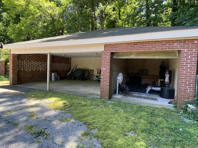 view of parking with a garage