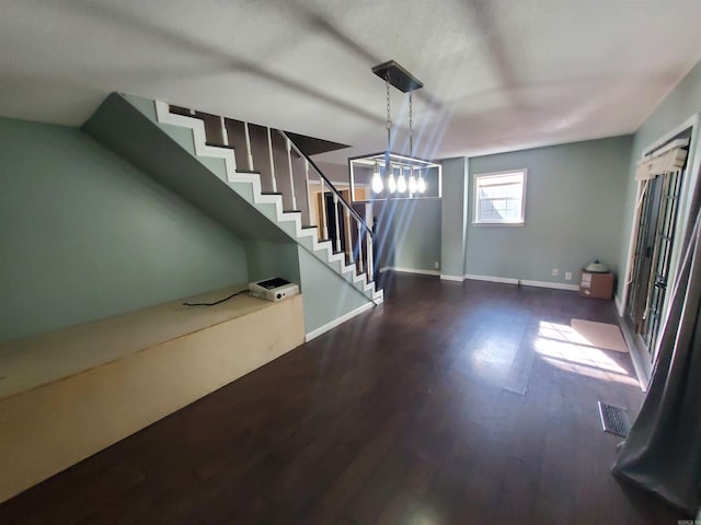 interior space with dark hardwood / wood-style floors