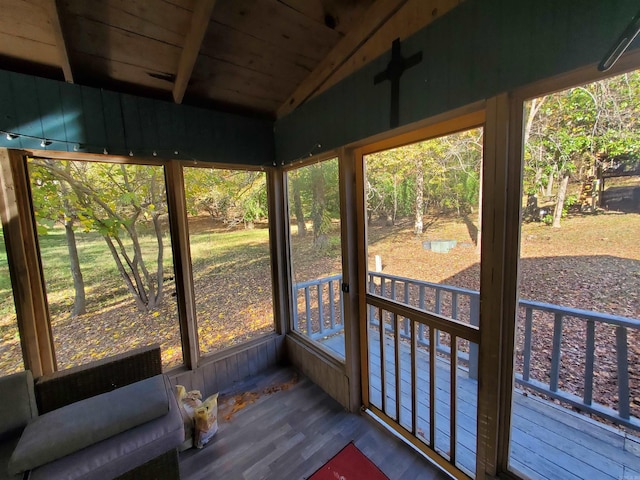 sunroom with wooden ceiling