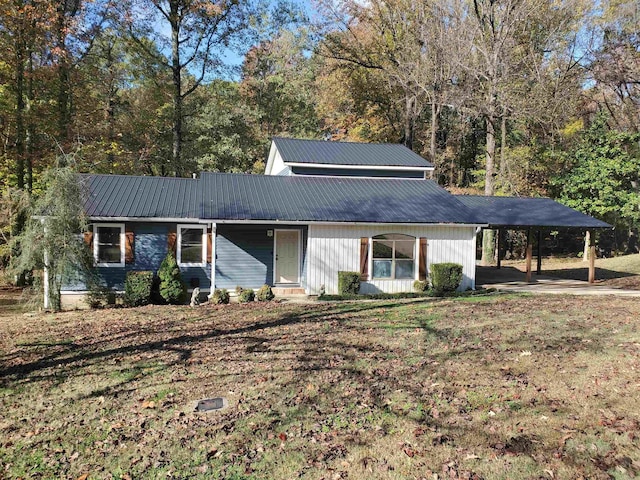 view of front facade with a carport