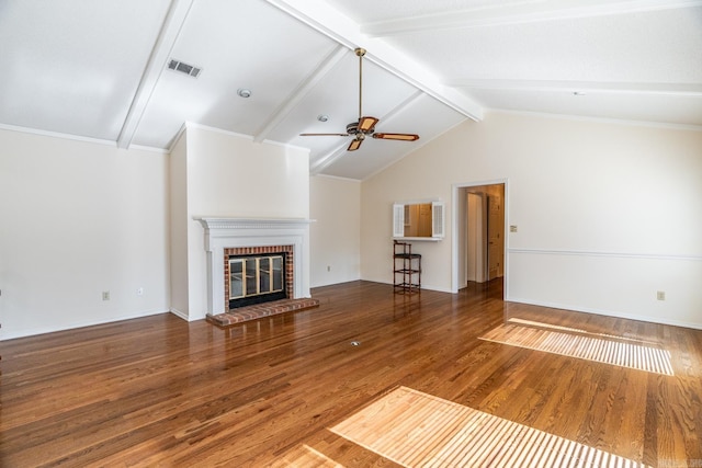 unfurnished living room with hardwood / wood-style floors, ceiling fan, a fireplace, and lofted ceiling with beams