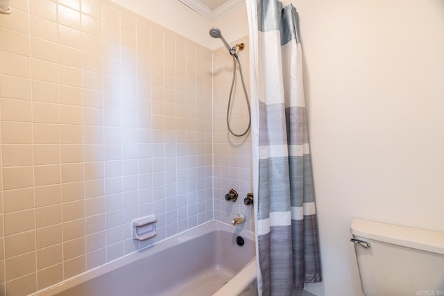 bathroom with toilet, shower / bath combo with shower curtain, and ornamental molding