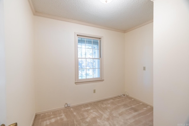 unfurnished room with light carpet, crown molding, and a textured ceiling